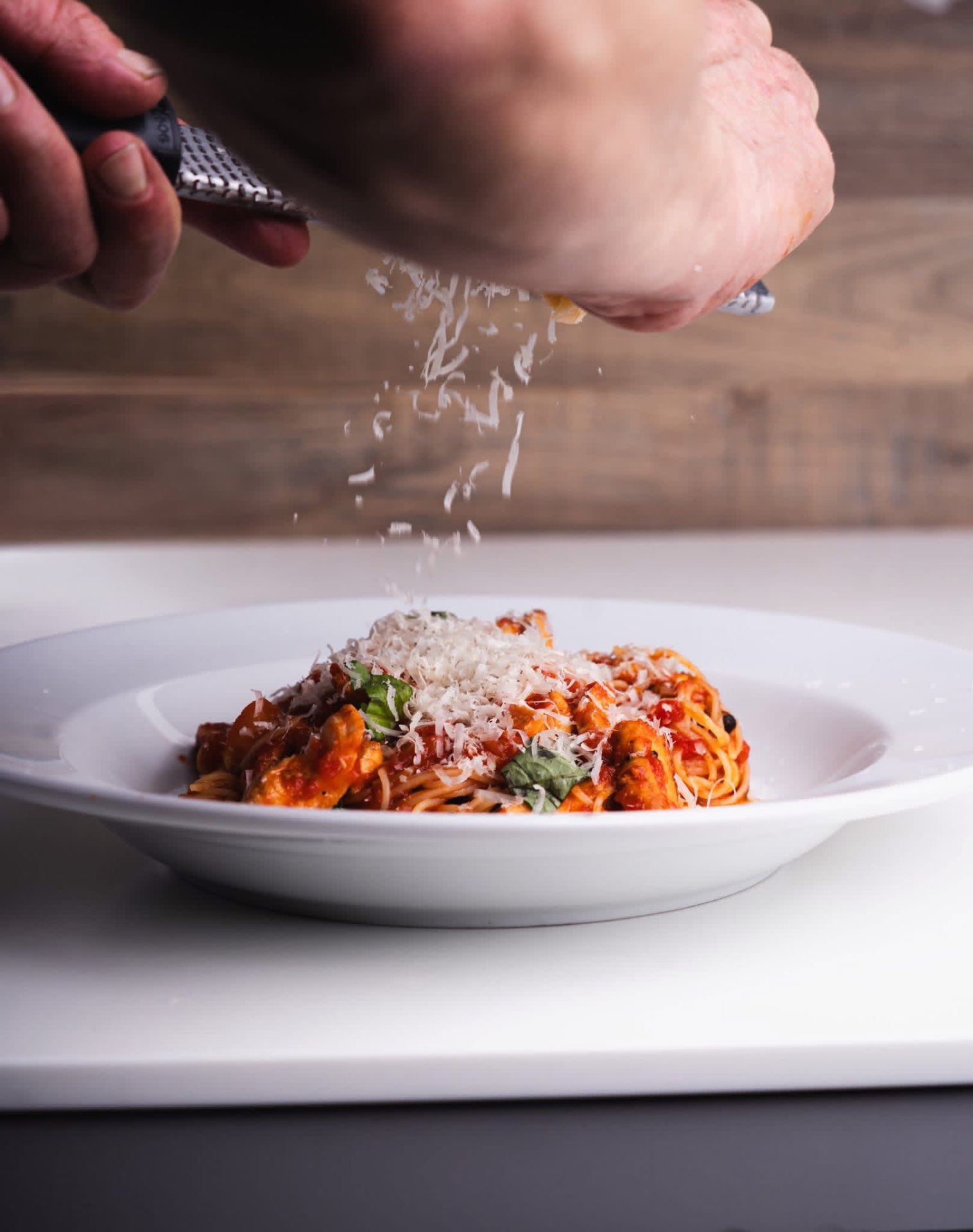 Spaghetti with tomato sauce and fresh parmesan